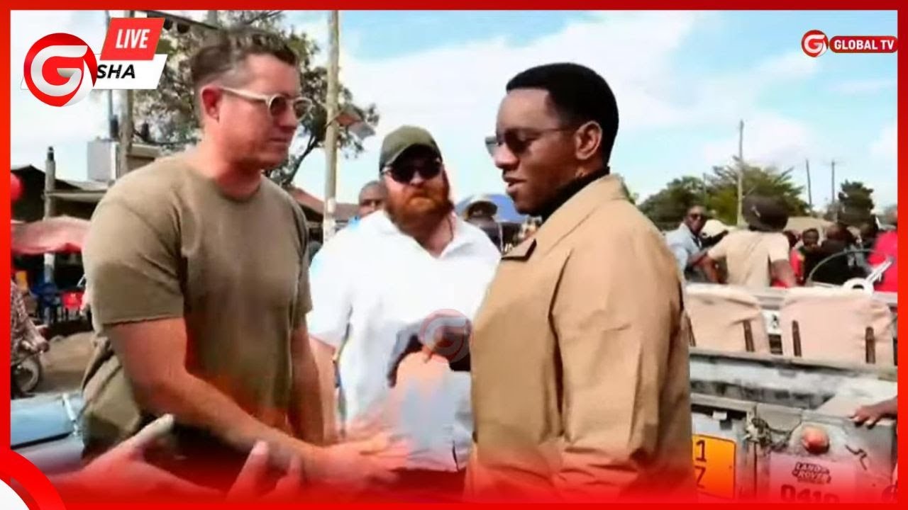 MAKONDA ASHUKA KWENYE GARI KUWASALIMIA WAENDESHA LAND ROVER WALIOJIPANGA BARABARANI....