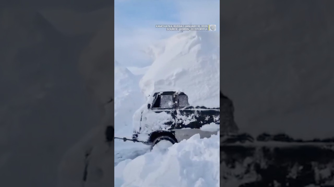 Snowbanks tower over doorways, bury cars after record snowfall in east Russia