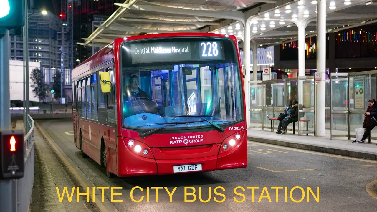 London's Buses after dark in White City bus station on 27th January 2023