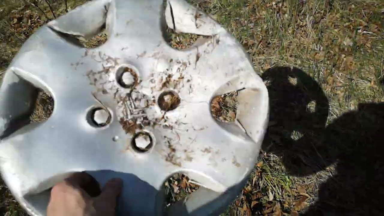 Scrapped Citroen hubcap