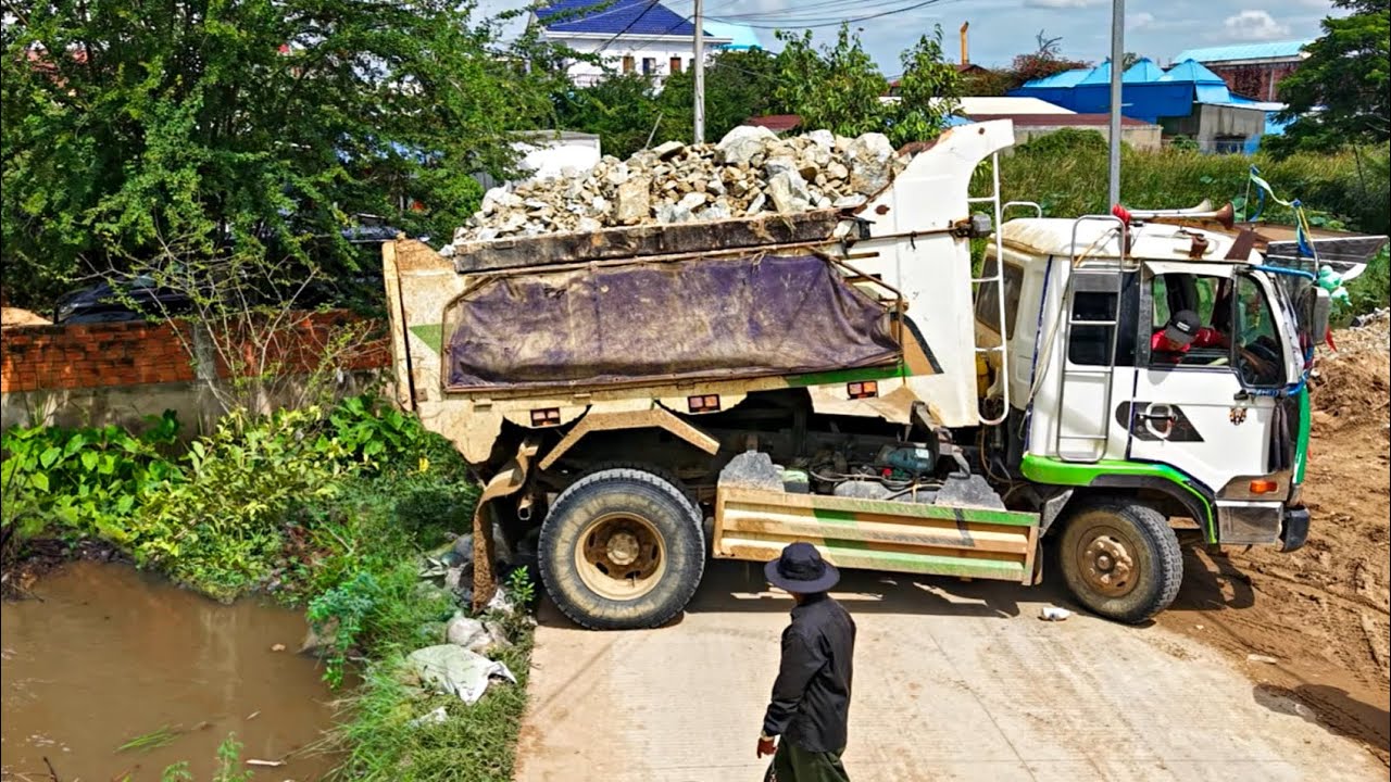 Amazing Start New Project!! Dump truck Unloading Stone with Bulldozer