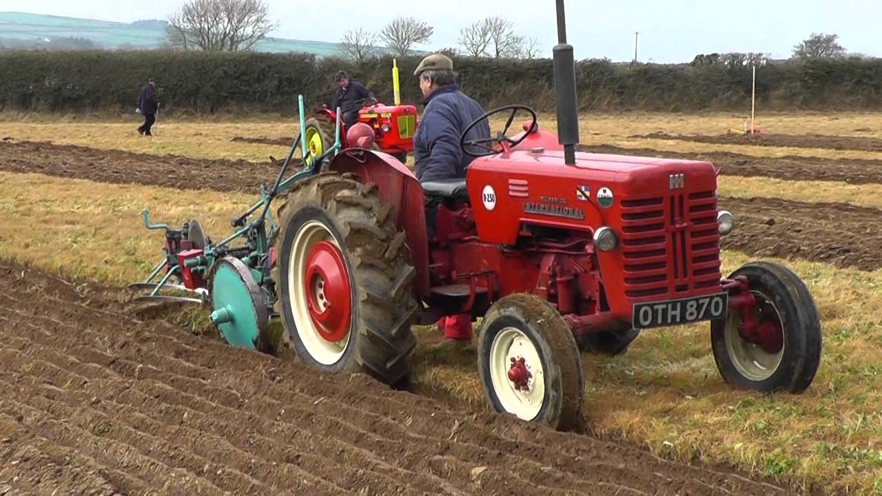 Ancient Tractors Ploughing.
