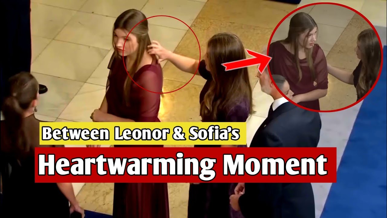 Принцесса Леонор расчесывает волосы инфанты Софии во время церемонии награждения