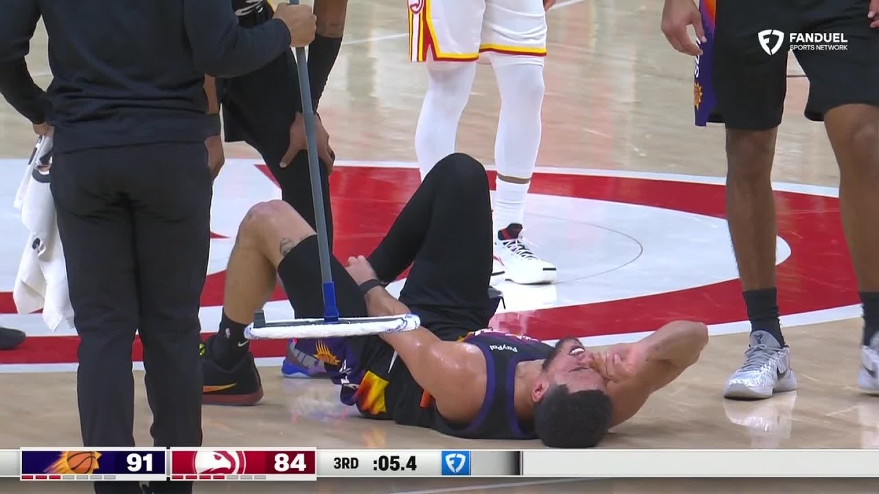 Devin Booker leaves game after suffering apparent ankle injury | NBA on ESPN