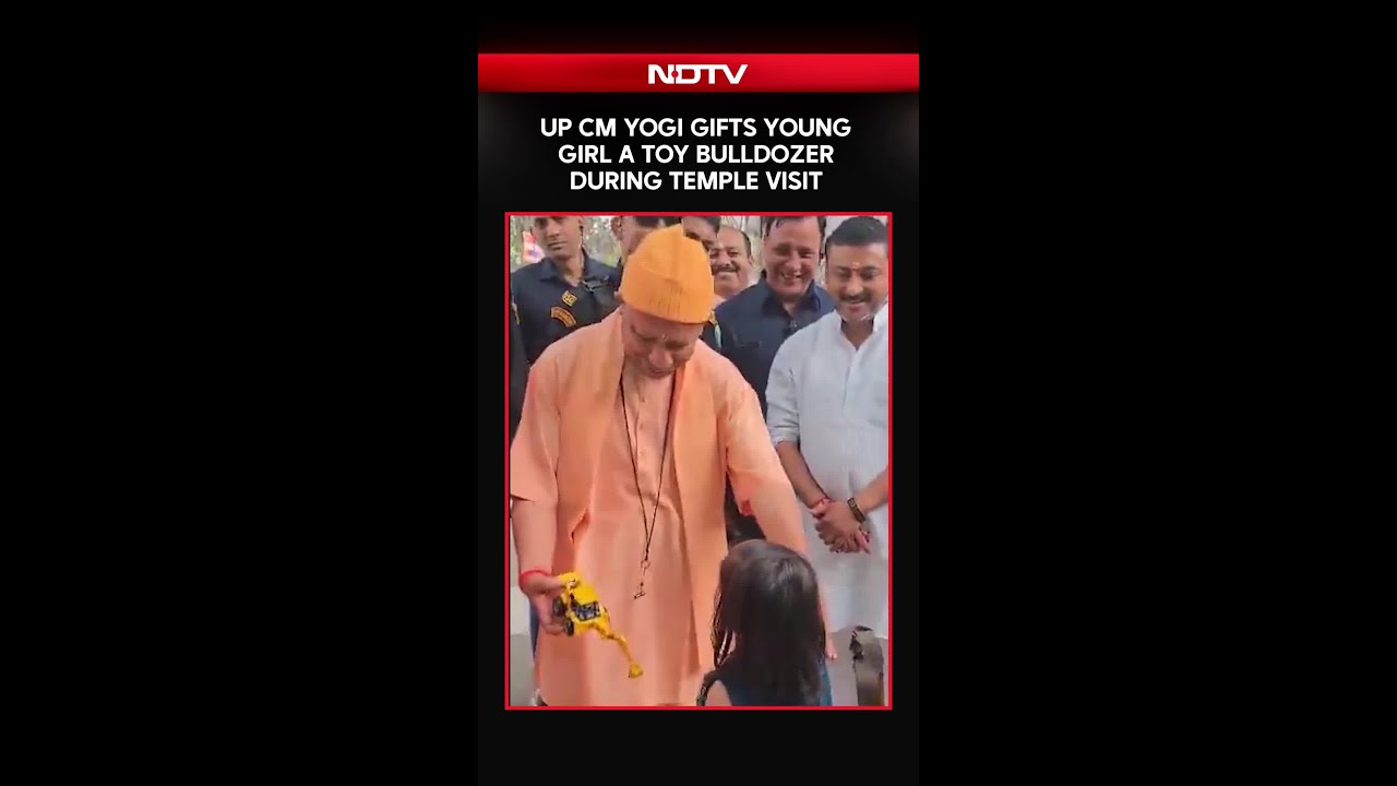 Uttar Pradesh News | UP CM Yogi Adityanath Gifts Toy Bulldozer To Young Girl At Gorakhnath Temple