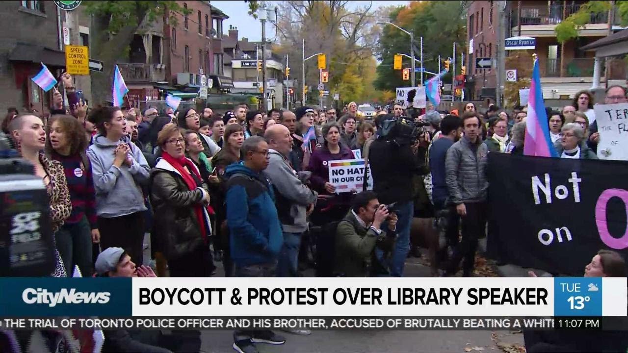 Hundreds protest controversial speaker at public library