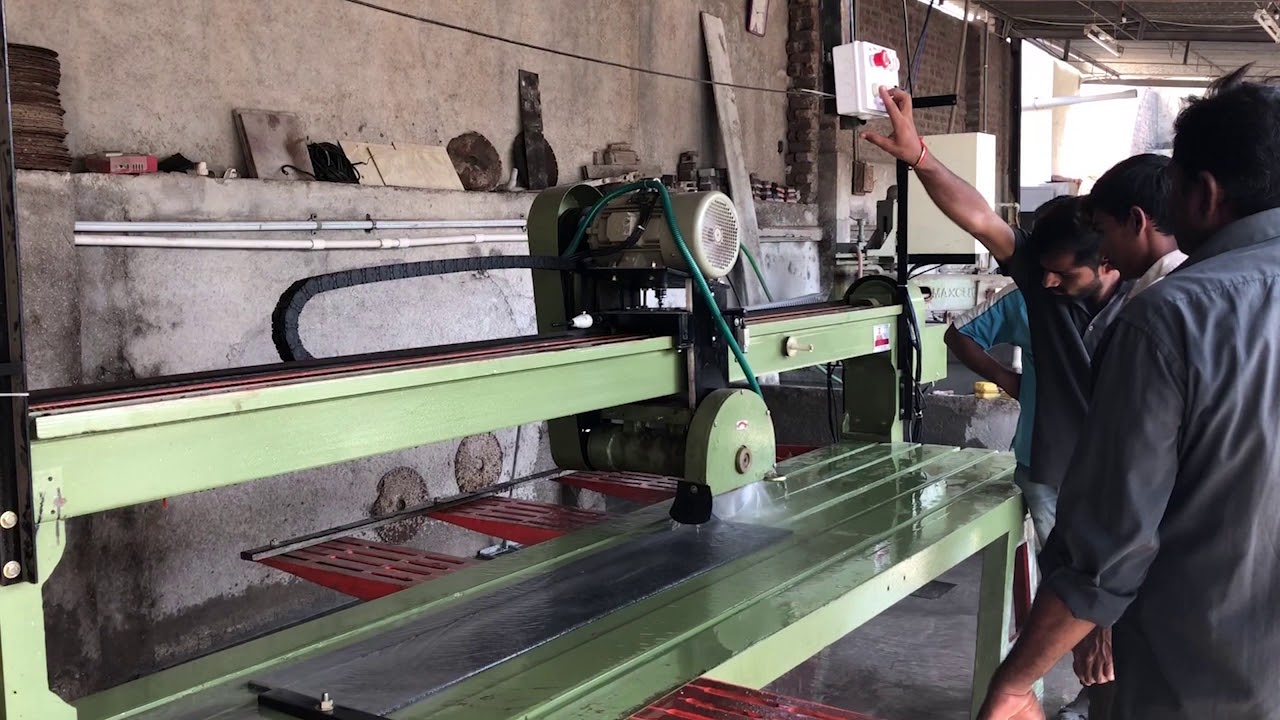 AUTOMATIC STONE EDGE CUTTING MACHINE