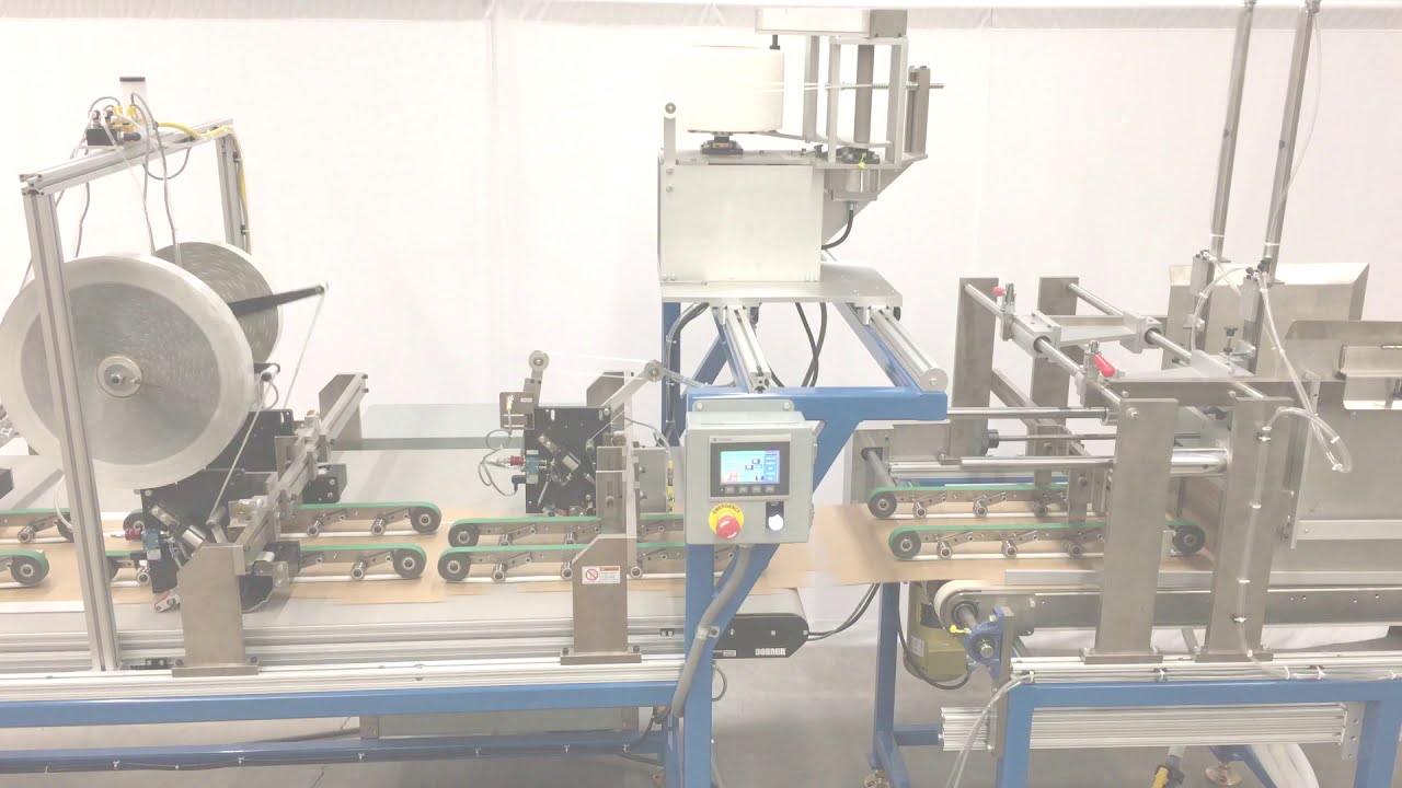 SD-40 / SF-40 TAPE APPLICATION SYSTEM WITH FEEDER
