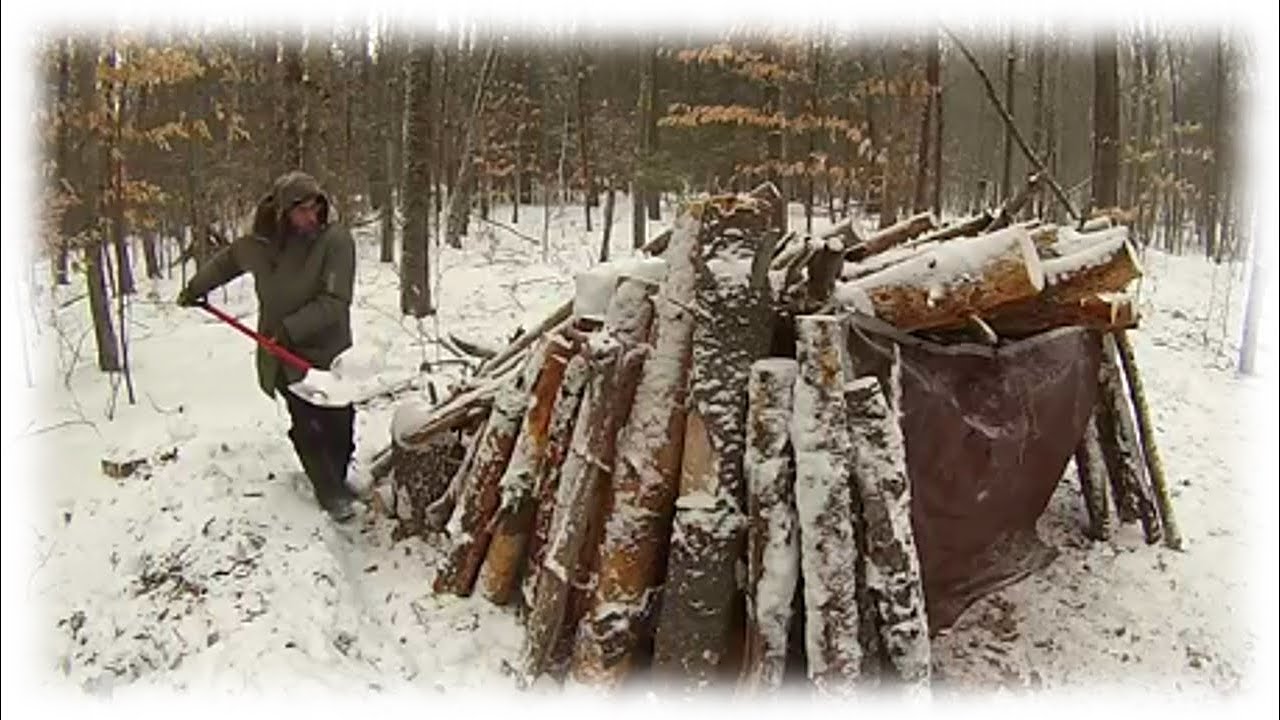 Built a Log Shelter to survive a snow storm blizzard.  Bushcraft / Survival Skills.  Winter camping.