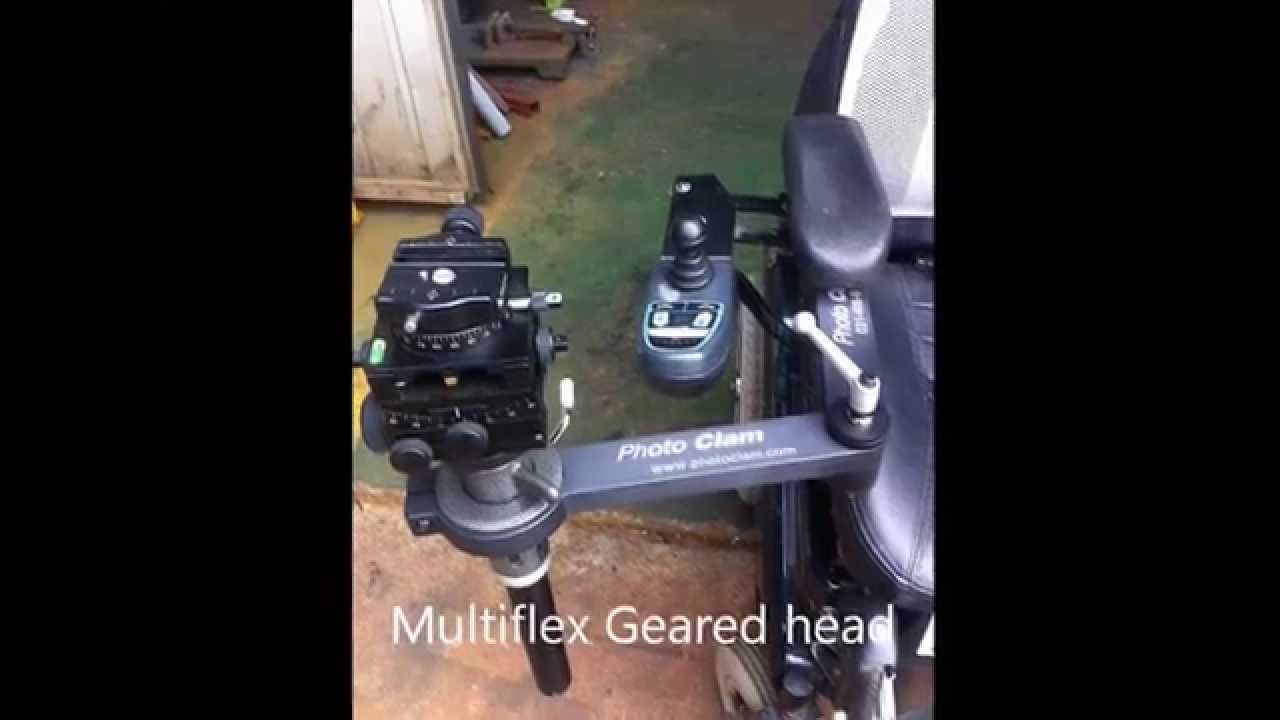 Multiflex geard cube head for a photographer in a wheelchair