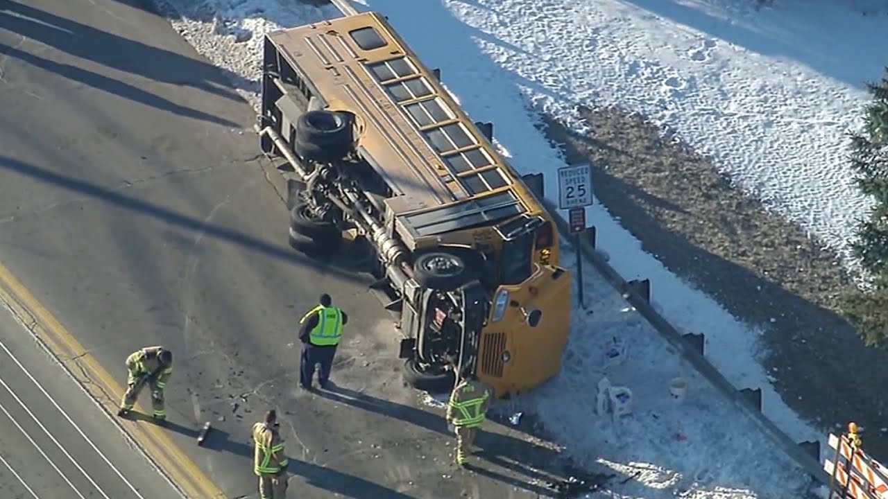 Scene footage: 1 hurt after school bus rolls over in Plymouth Township crash, police say