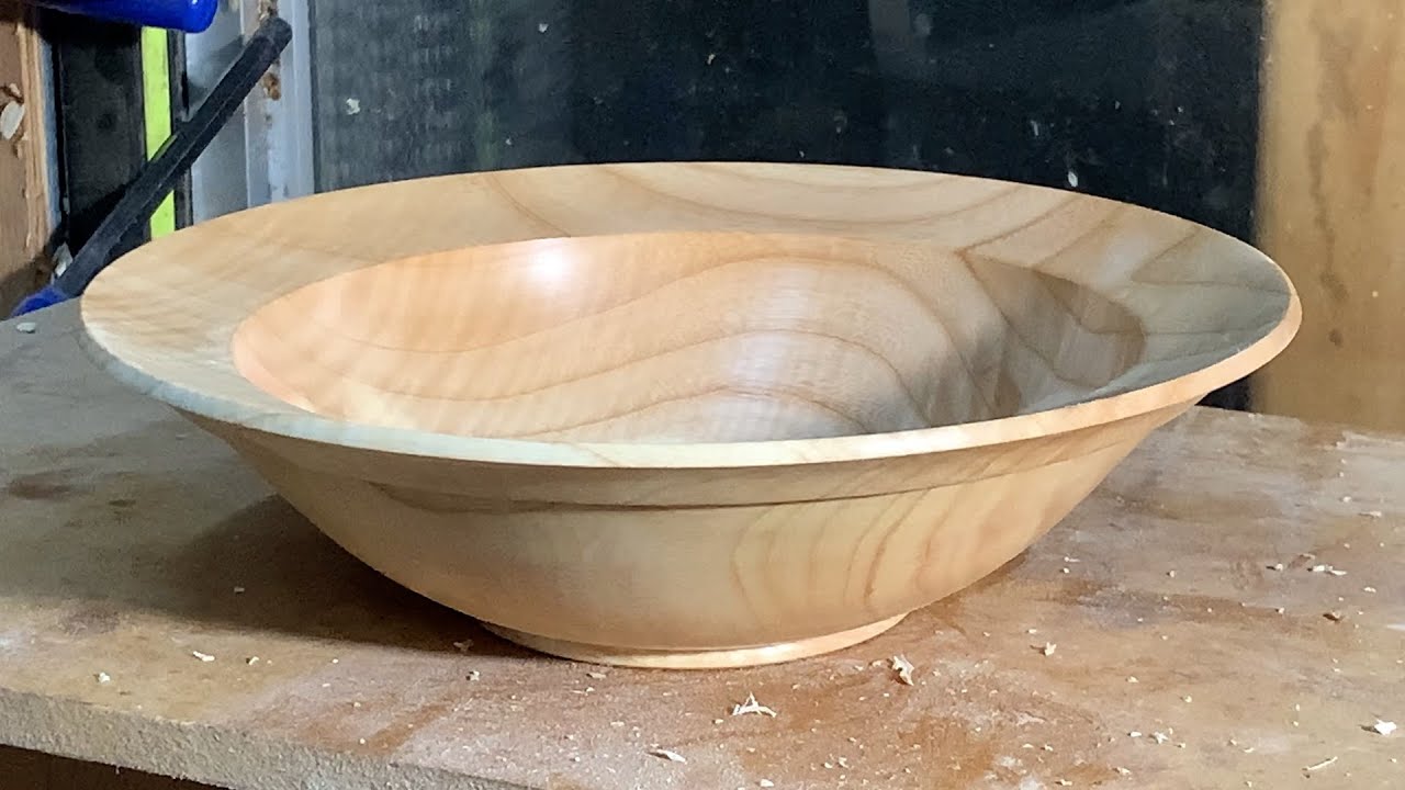 Richard Raffan turns a core saved from an ash bowl.