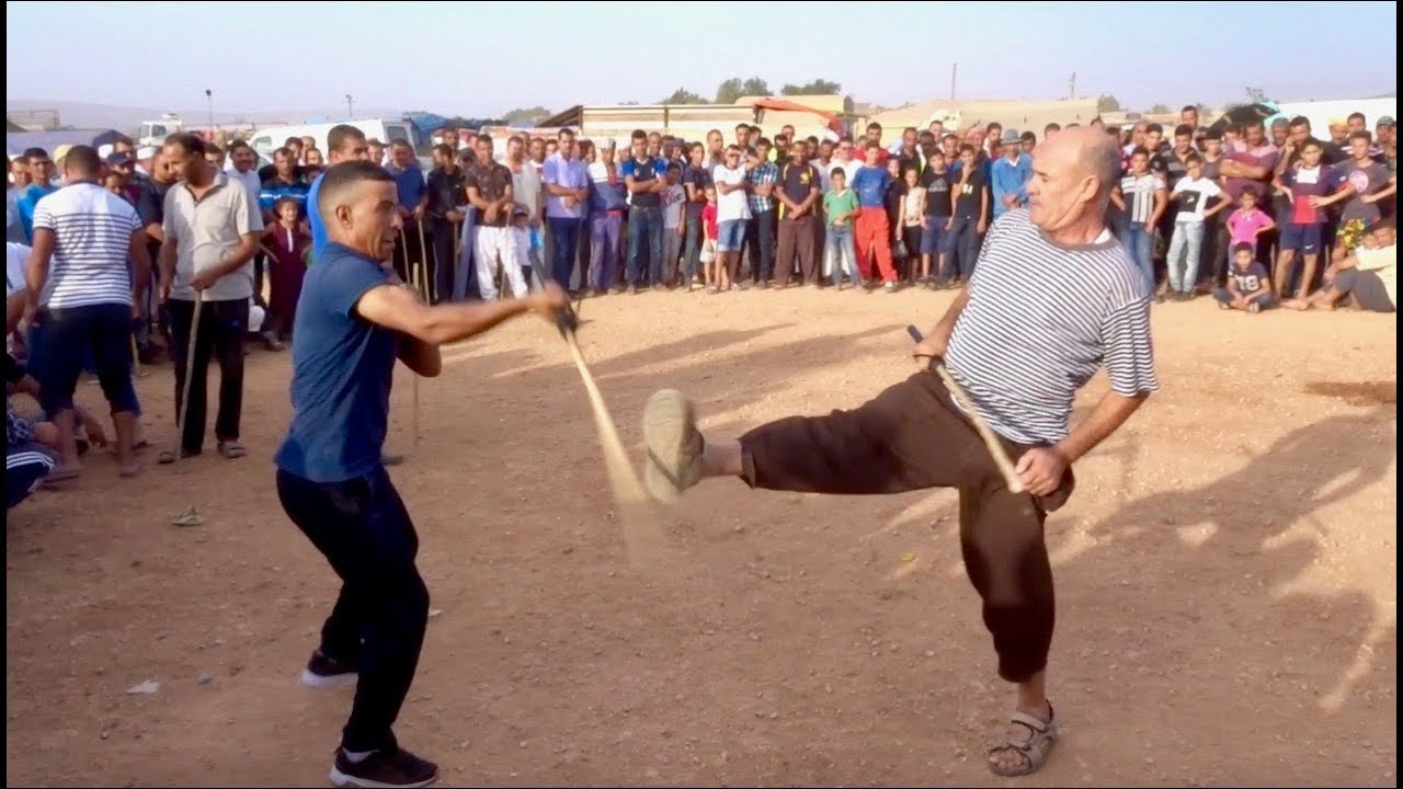 Combat de matraque 25  مبارزة بالعصا