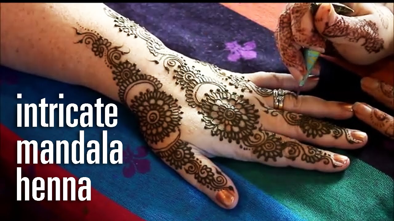 Demonstration of intricate henna mandala pattern - Mumbai style mehndi inspiration