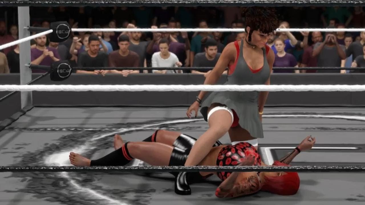 OCW 2k25 118 Janan Mtairi crouches over a downed Heather Rose!