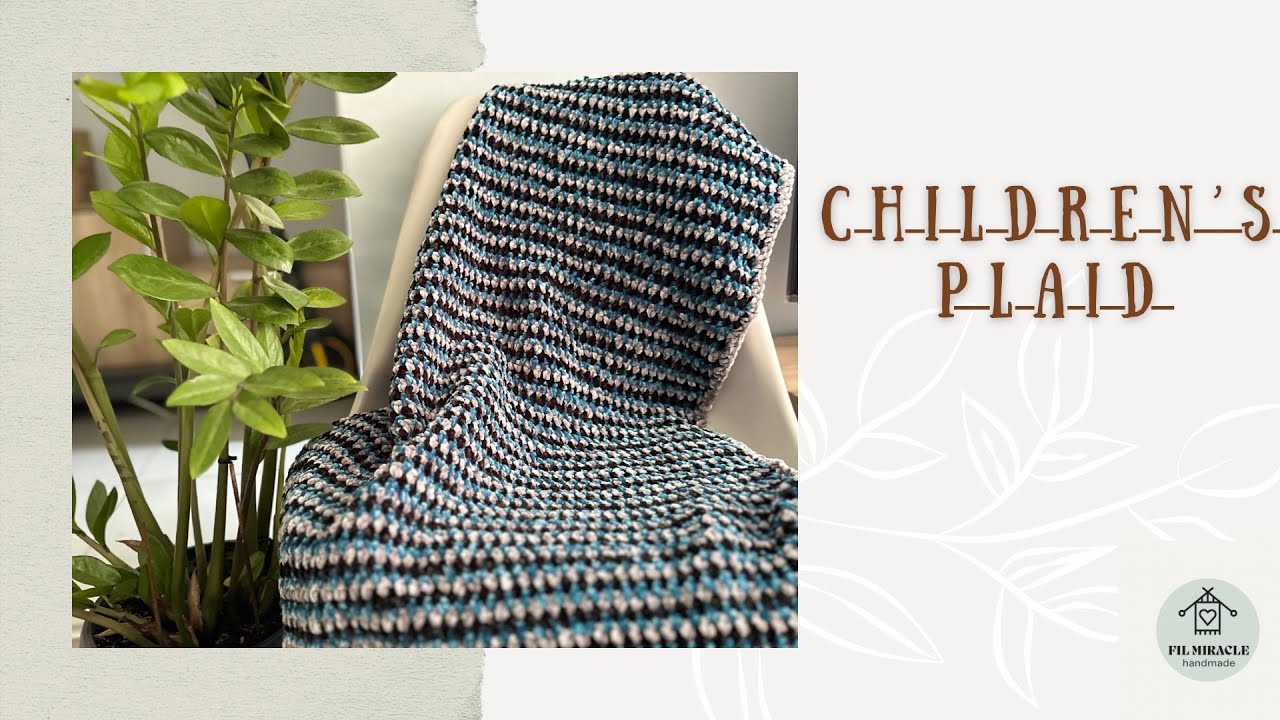 Master class on knitting a baby plaid from velvet threads.