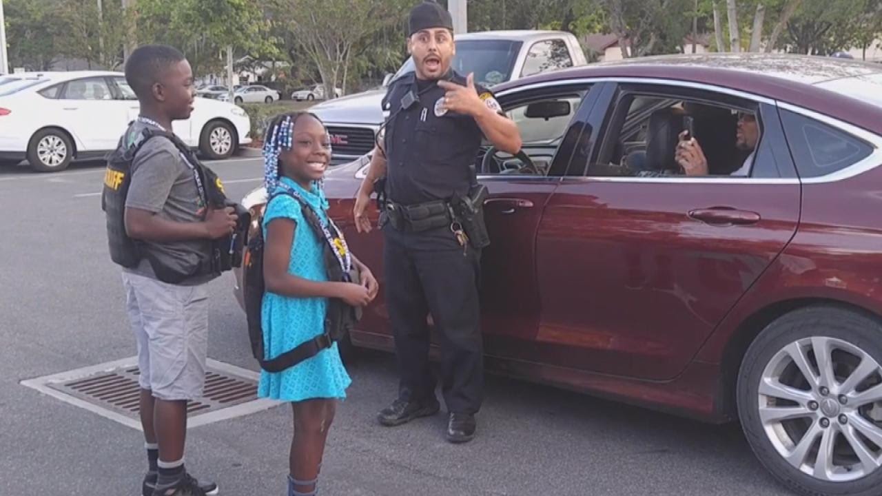 9-Year-Old Girl Who Cried About Police Shootings Gets To 'Arrest' Officers