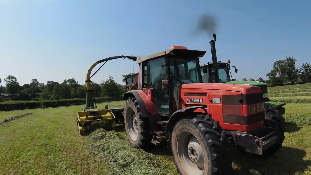 silaging with a trailed harvster jd 3765 same antares