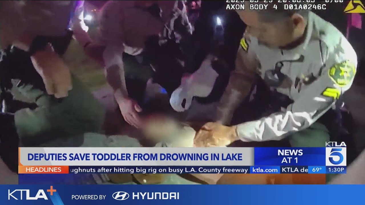 Dramatic footage shows deputies rescue drowning toddler from lake