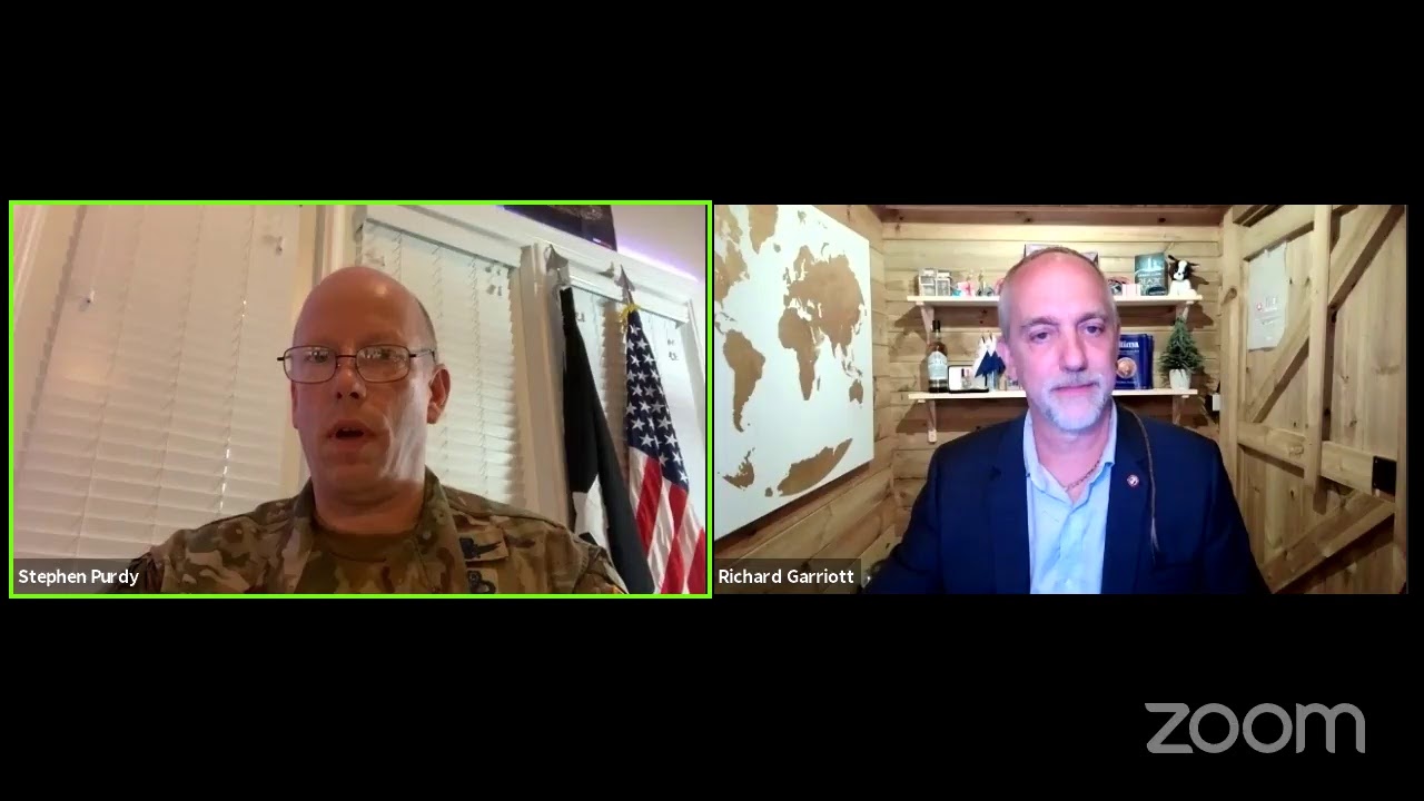 Brigadier General Stephen G. Purdy, Jr. in conversation with Club President Richard Garriott