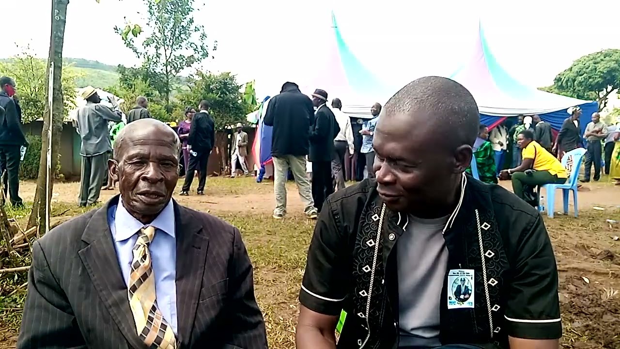 Onyango Achiyo of Migori Super Stars with Jojo Jakaleo home of the late Oriro Nyaguok