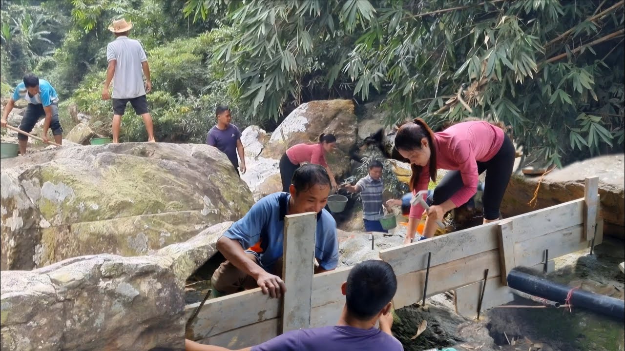 Construction of the water dam and support pillars.  Water supply to the farm, fish stocking begins.