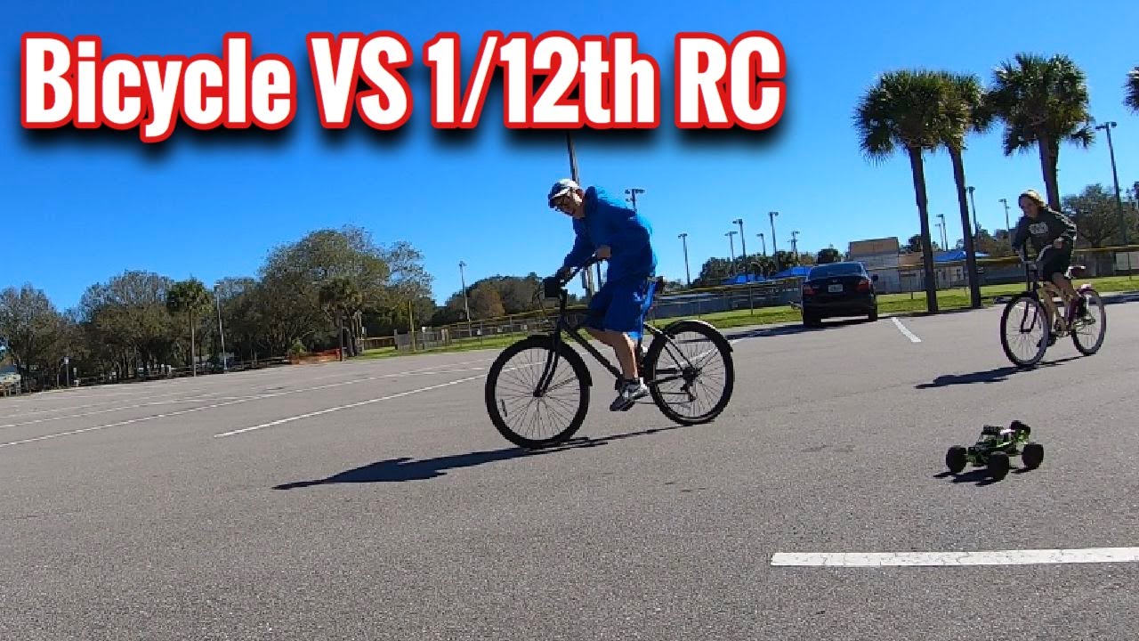 WLtoys 12427 2.4G 1/12 4WD VS Bicycle! OMGRC