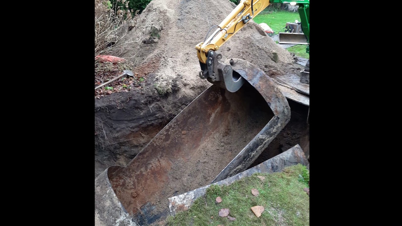 Verwijderen ondergrondse huisbrandolie tank in Bilthoven. Milieukundige begeleiding Hopman en Peters