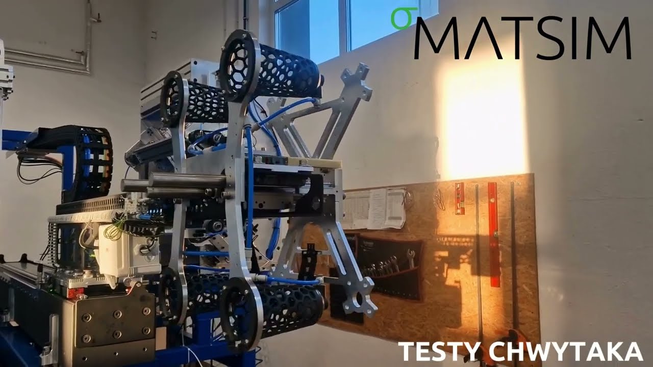 23.109.00 - Magnetic driven side-entry IML robot