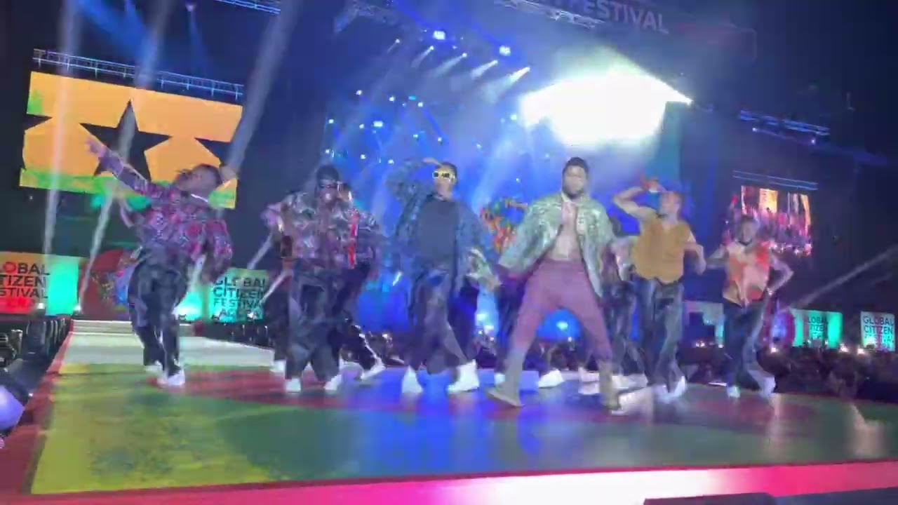 Dwp Academy performing party with Usher at the global citizen festival in Ghana