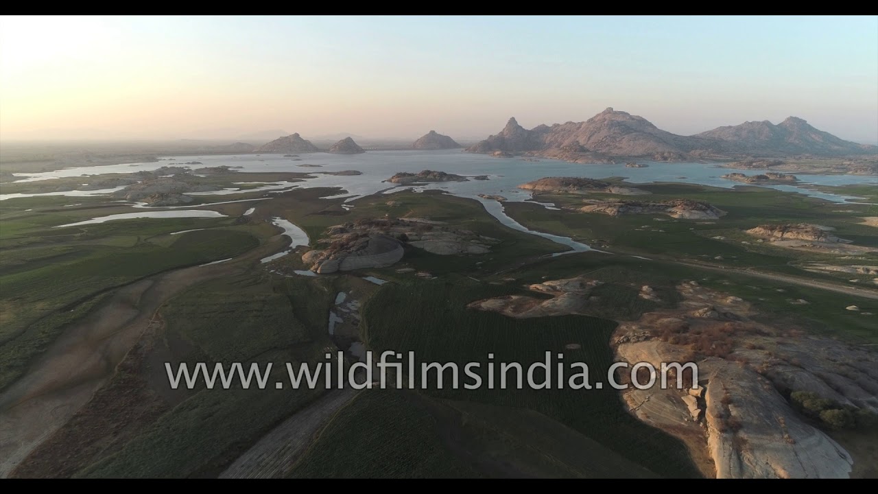 Jawai Bandh dam: Aerial view of the reclaimed Rajasthan desert from a voracious Mexican plant
