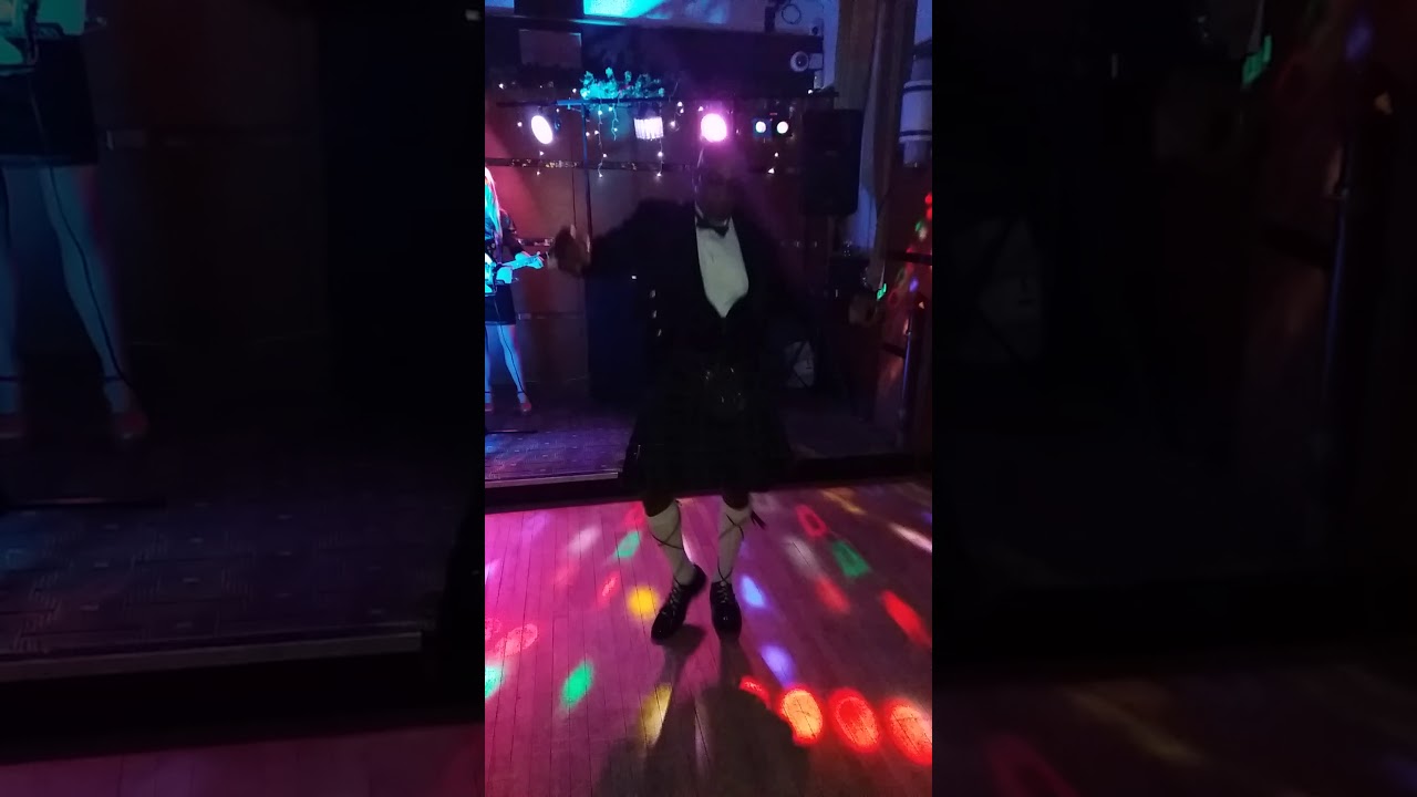 The only black man in a Scottish kilt dancing to an Irish song