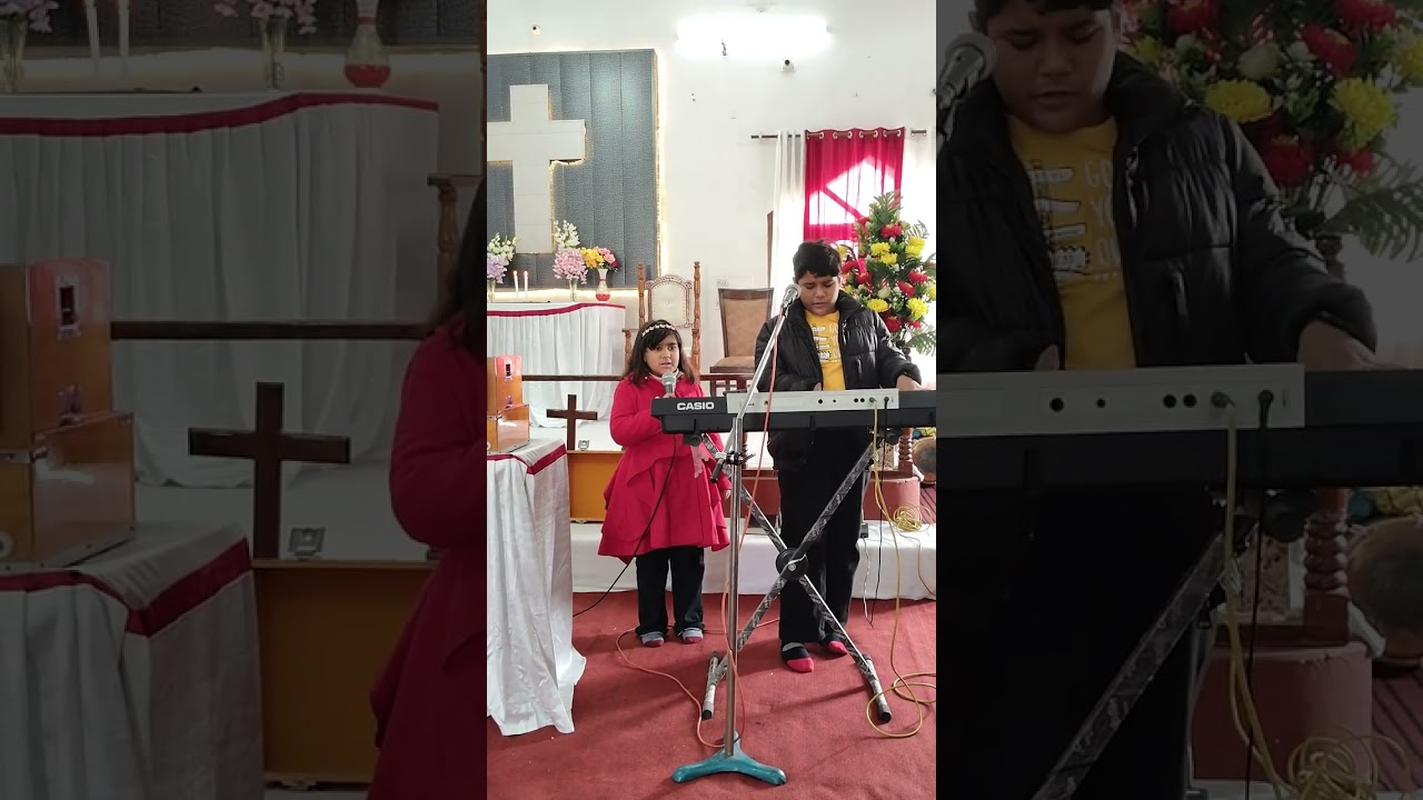 Jason is singing main khoon kharida hoon song on keyboard with his sister Rayna in c.n.i. church