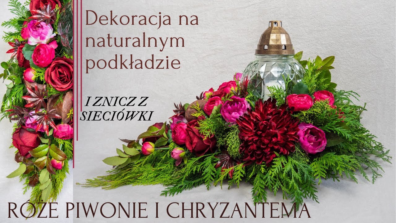 KOMPOZYCJA NA GRÓB W PIĘKNYCH KOLORACH W KSZTAŁCIE ŁEZKI ZE ZNICZEM