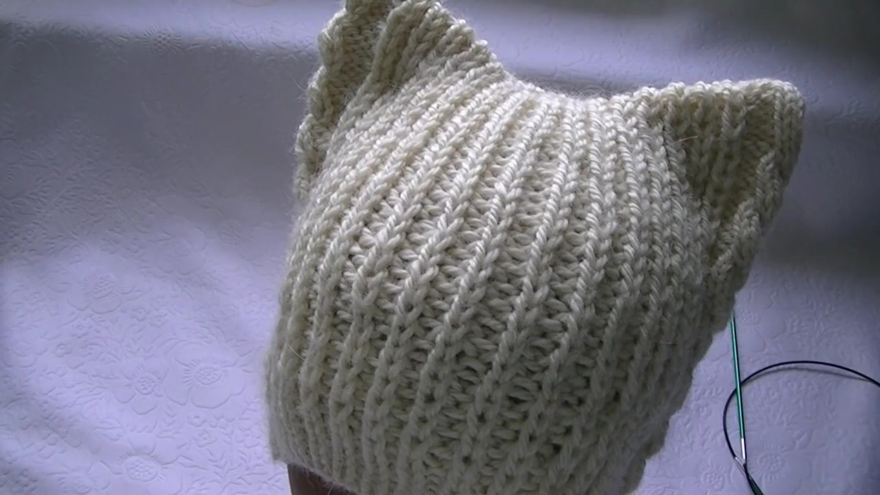 Hand-knitting of a hat with cat's ears.