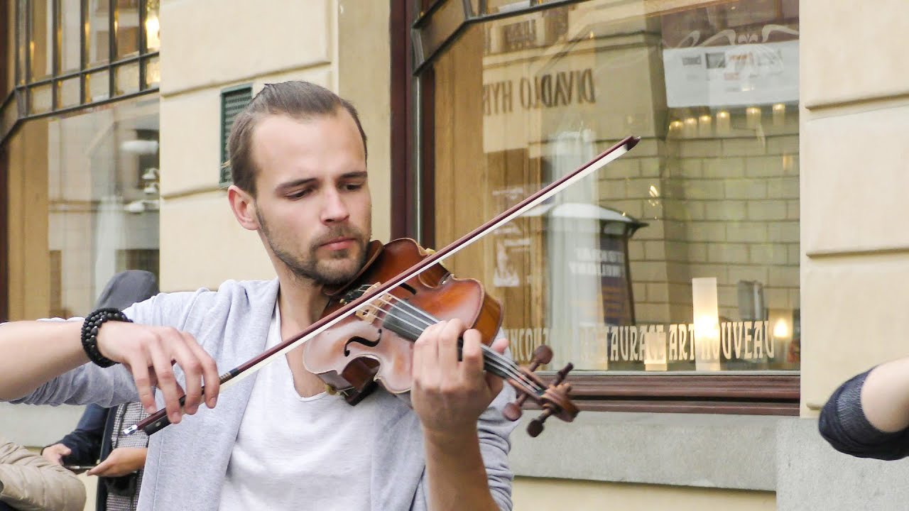 Violins in Concert in the Street of Prague. Czech Republic