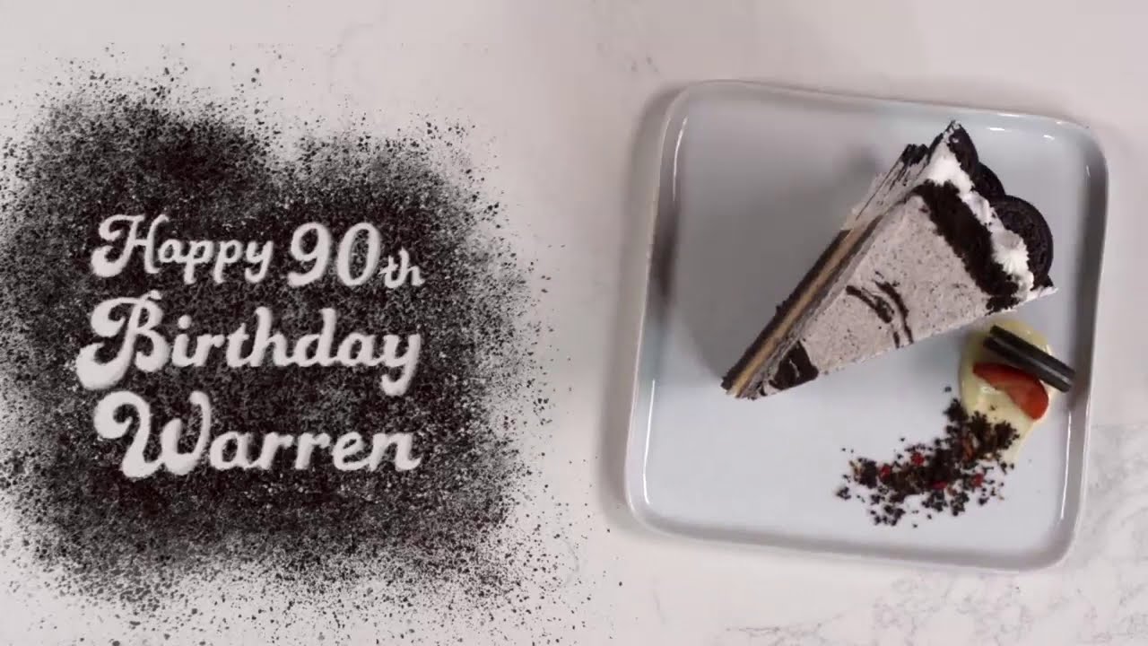 Bill Gates makes a cake for Warren Buffett