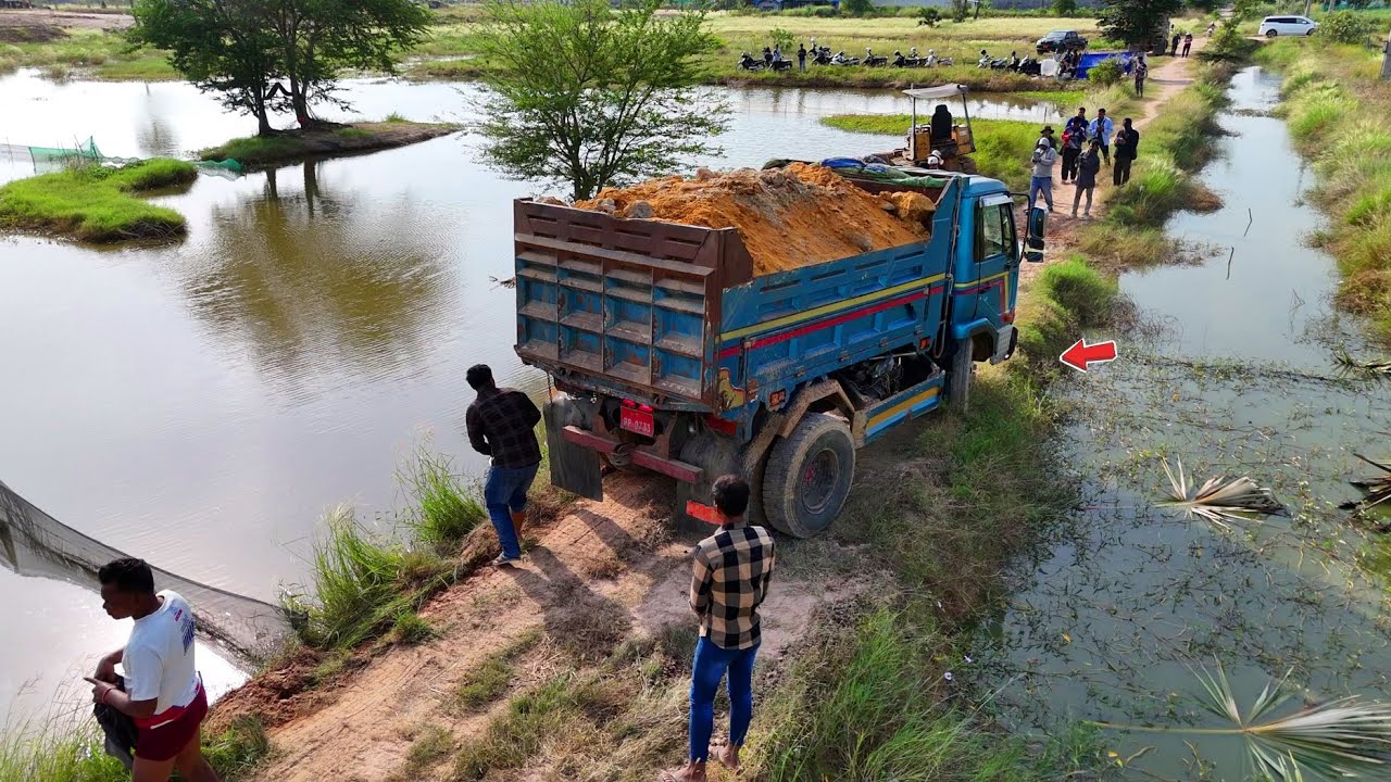 Proceed carefully Start Landfill Near canal Using Dozer Pushing & Truck 5Ton Dumping Soil, Mix VDO