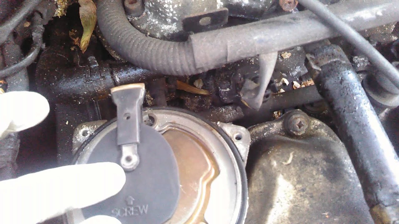 Distributor Cap and Rotor removed/ replaced 1998 Mercury Villager