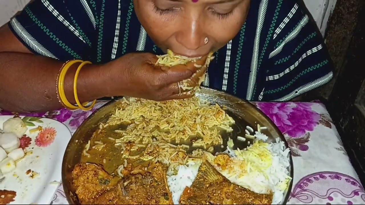 EATING SPICY CHICKEN CURRY AND RICE