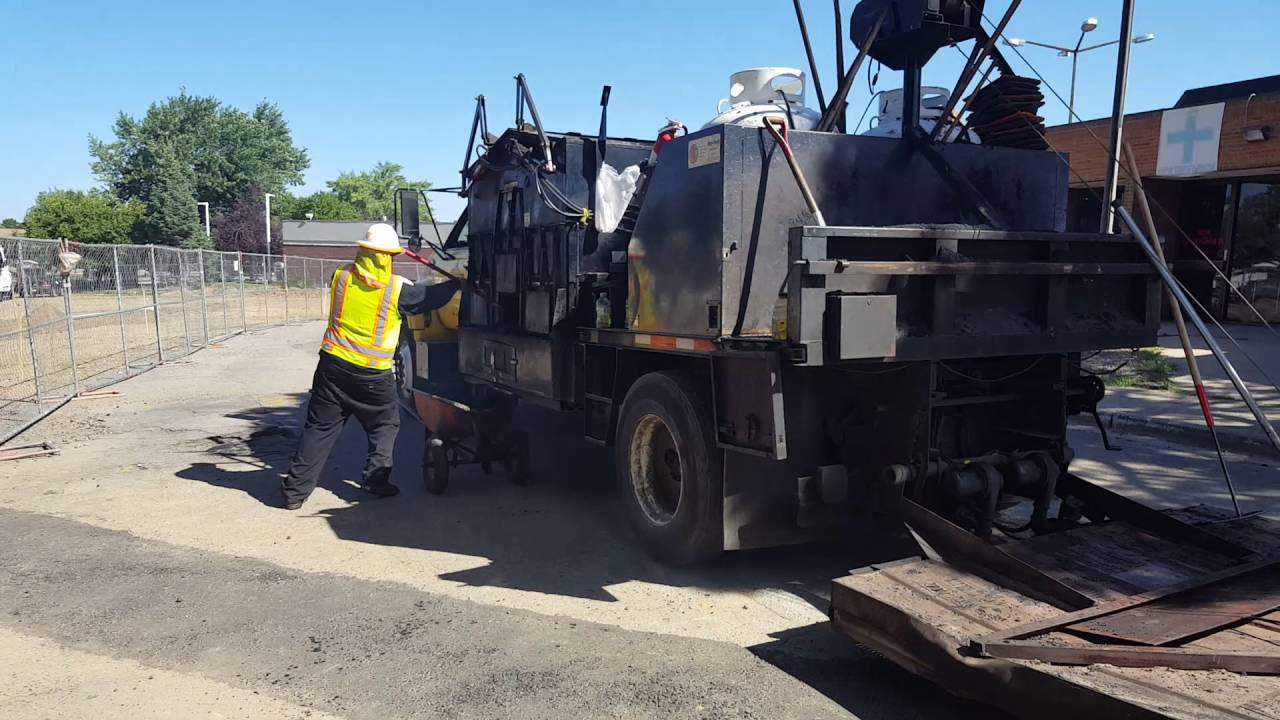 How to repair asphalt.  Works for city streets, parking lots, and driveways.