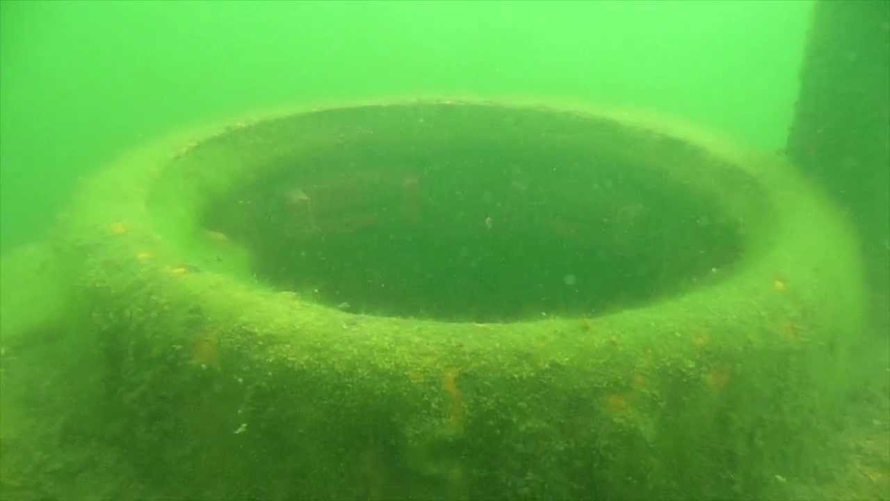 Diving on sunken tank T34 