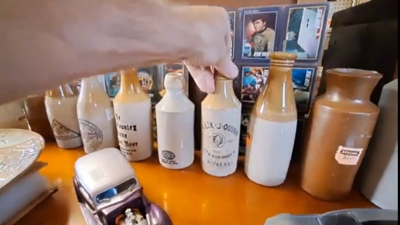 Antique Shop Price Gathering On Stoneware, Ginger Beers, Bottles, License Plates & Collectibles