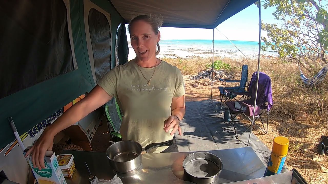 Cake in the Bush - Buttercake cooked in the camp oven over the coals with icing and choc chips.