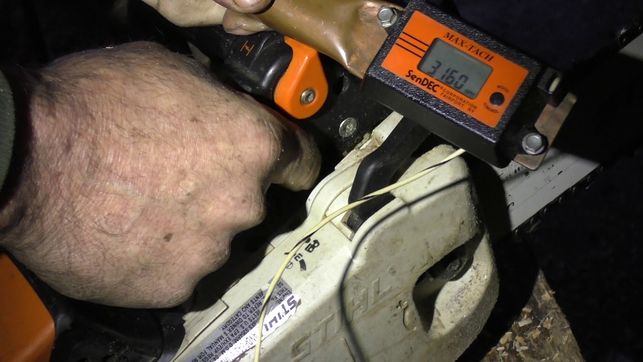 Tree Monkey tuning a Stihl 200T