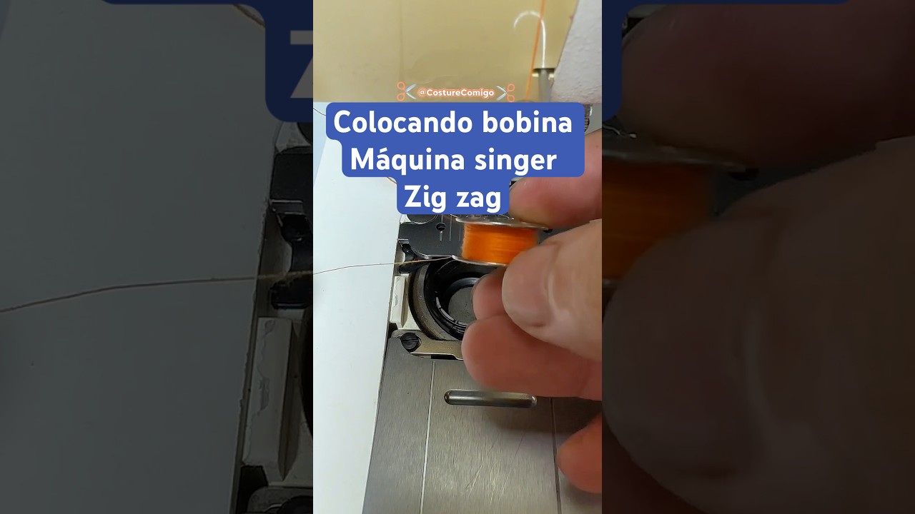 colocando a bobina na máquina singer zig zag. 