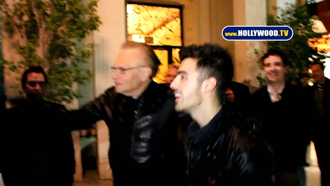 Larry King Greets Joe Jonas at Mastros Steakhouse