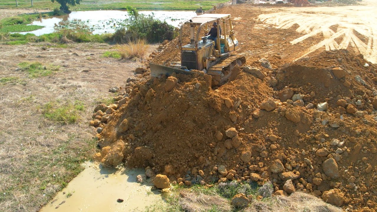 Great Work With Strong Machines Bulldozer Pushing Stones Connecting To South Direction