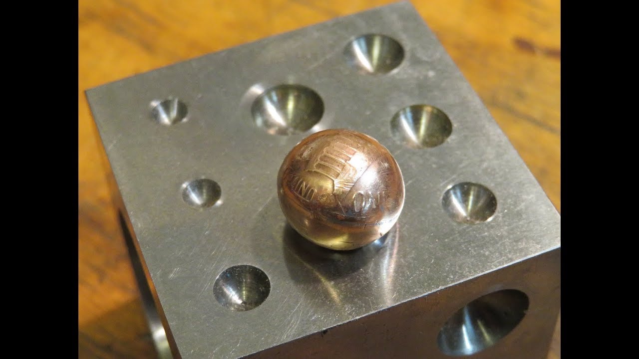 How to solder two coins into a ball.