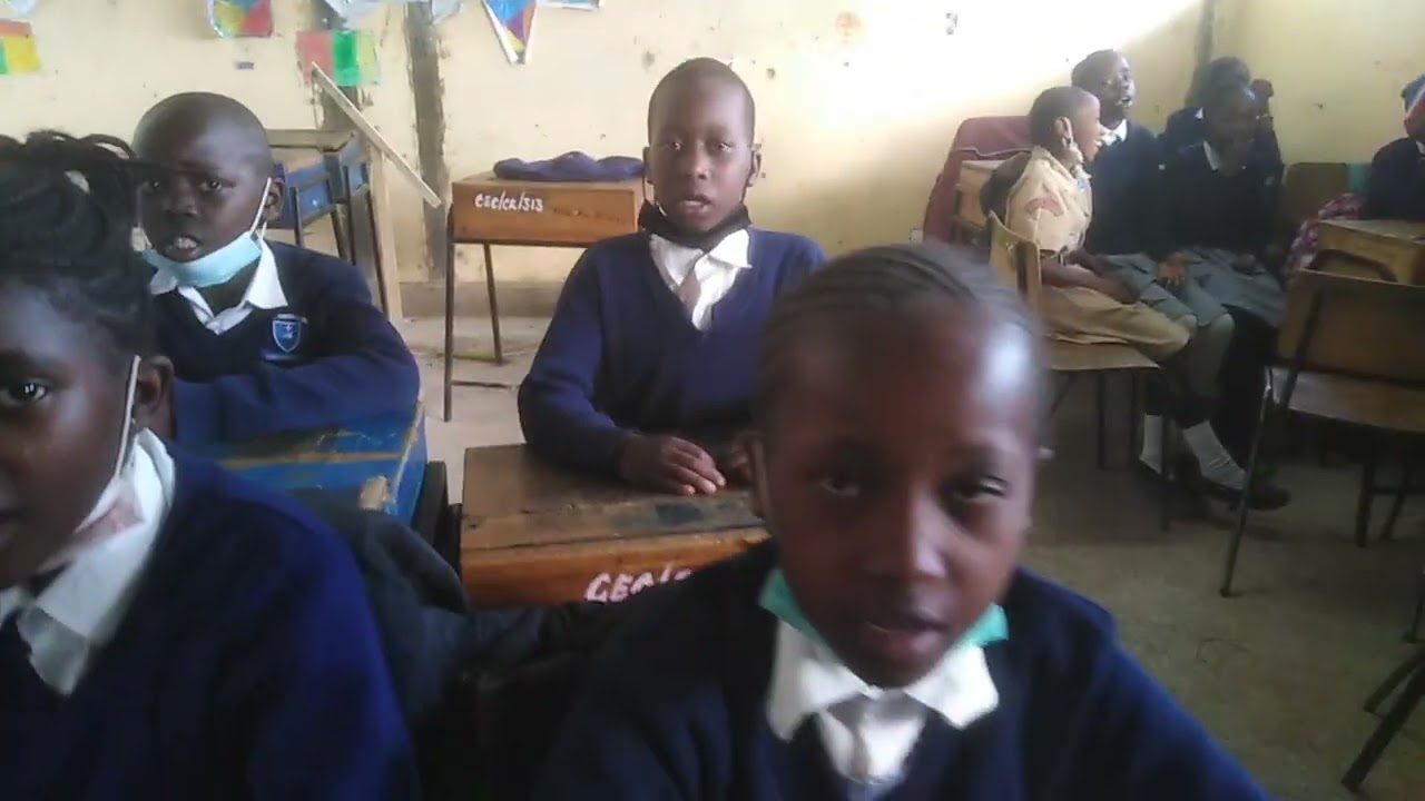 grade 4 singing East Africa anthem. Chrisco educational center, Woodley.